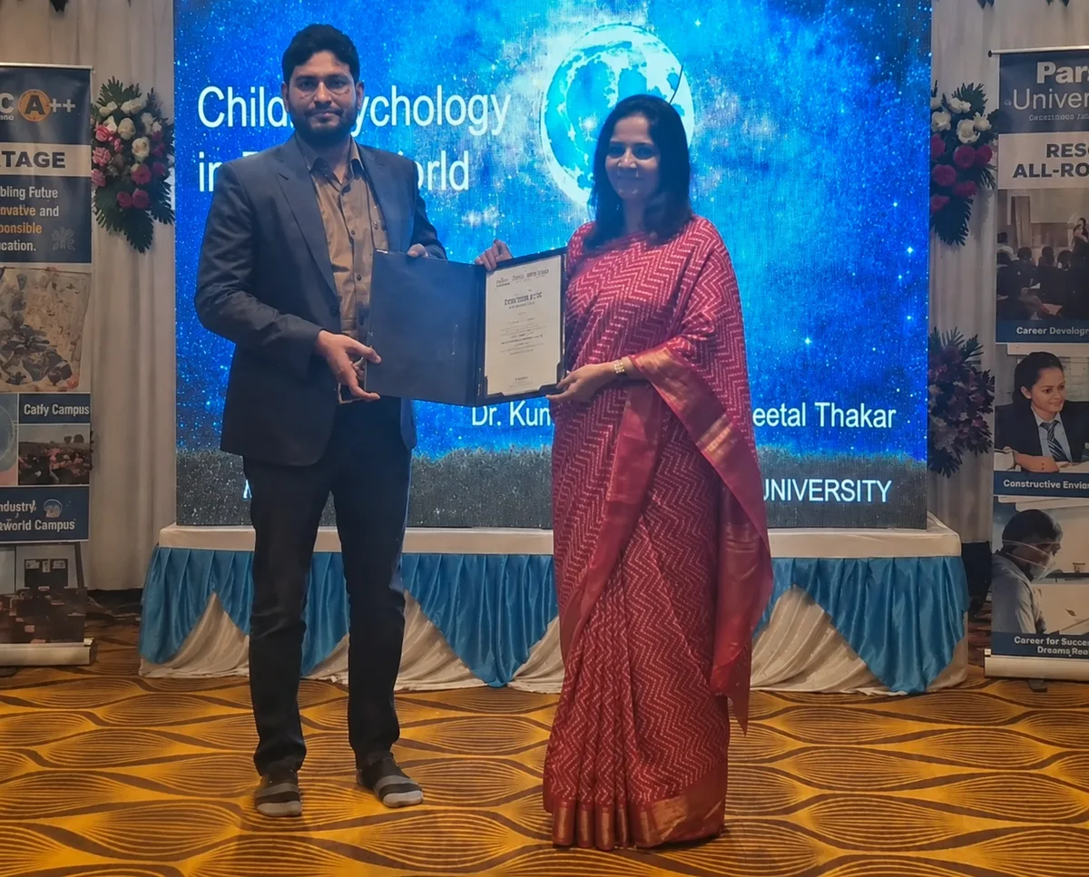 EASE ADO digital marketing agency Mira Road team receiving award at Child Psychology in Digital World conference