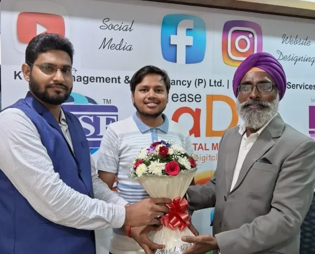 EASE ADO digital marketing agency team with client during appreciation ceremony